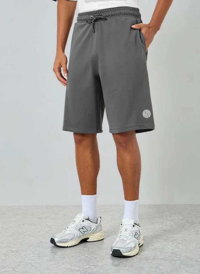 Styli  Men White Oversized Polo and Shorts Co-Ords for Men | Best Price UAE